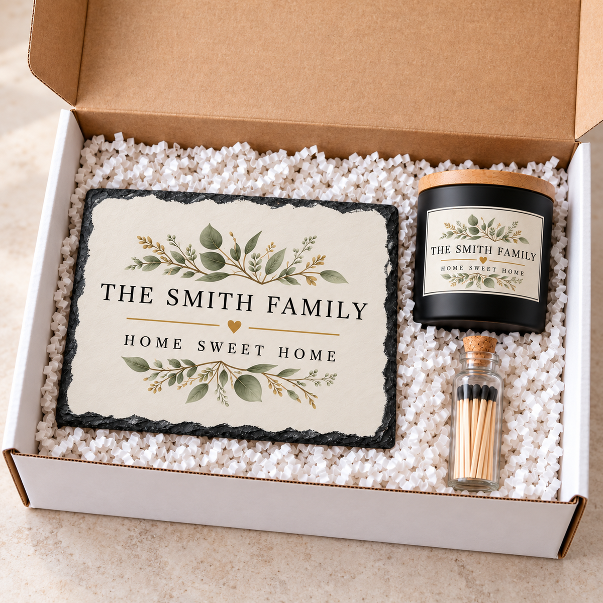 Personalized botanical Home Sweet Home slate, black candle and matches arranged in open gift box